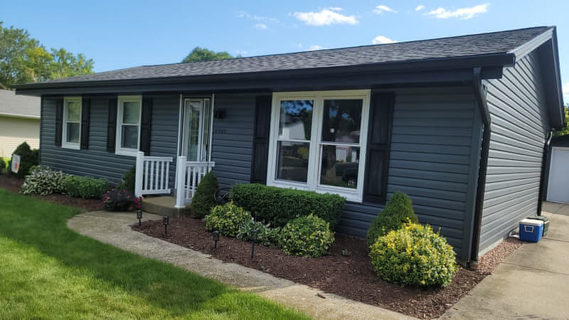 Gray ranch with new siding and trim