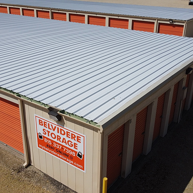 New white metal roof on Belvidere Storage commercial building, installed by Elite Contracting Group